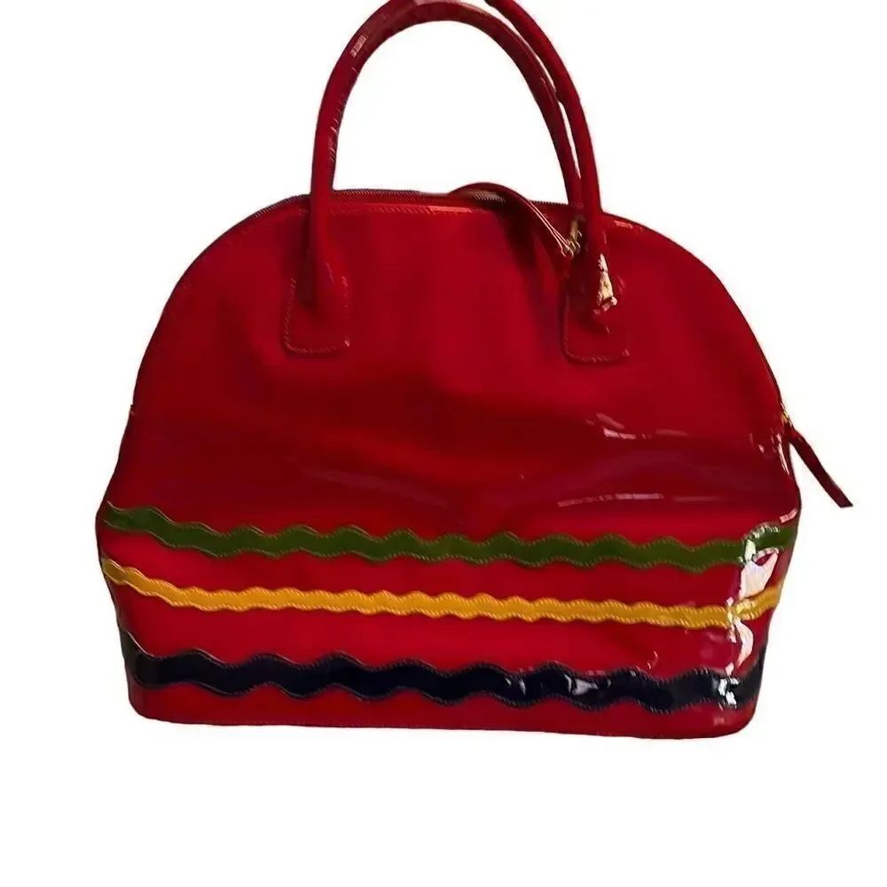 Sydie Lansing red patent purse.